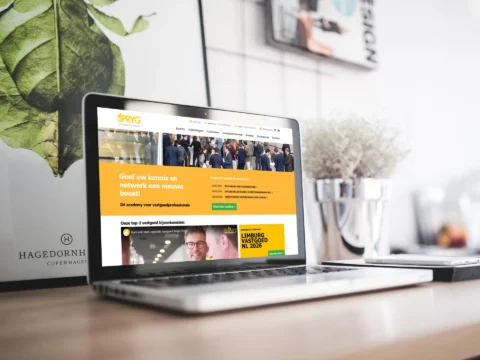 Impressie van homepage Spryg op een scherm.