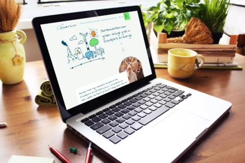 Impressie van homepage Conversion op een scherm.