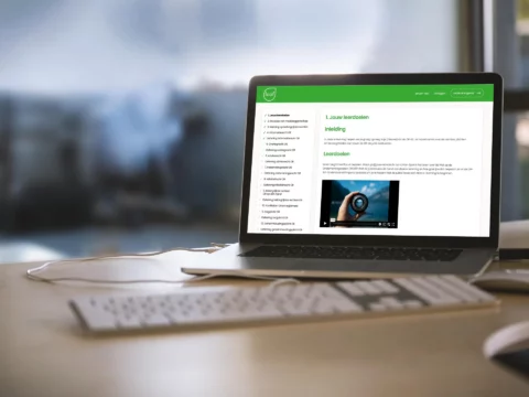 Impressie van homepage Loof e-learning op een scherm.